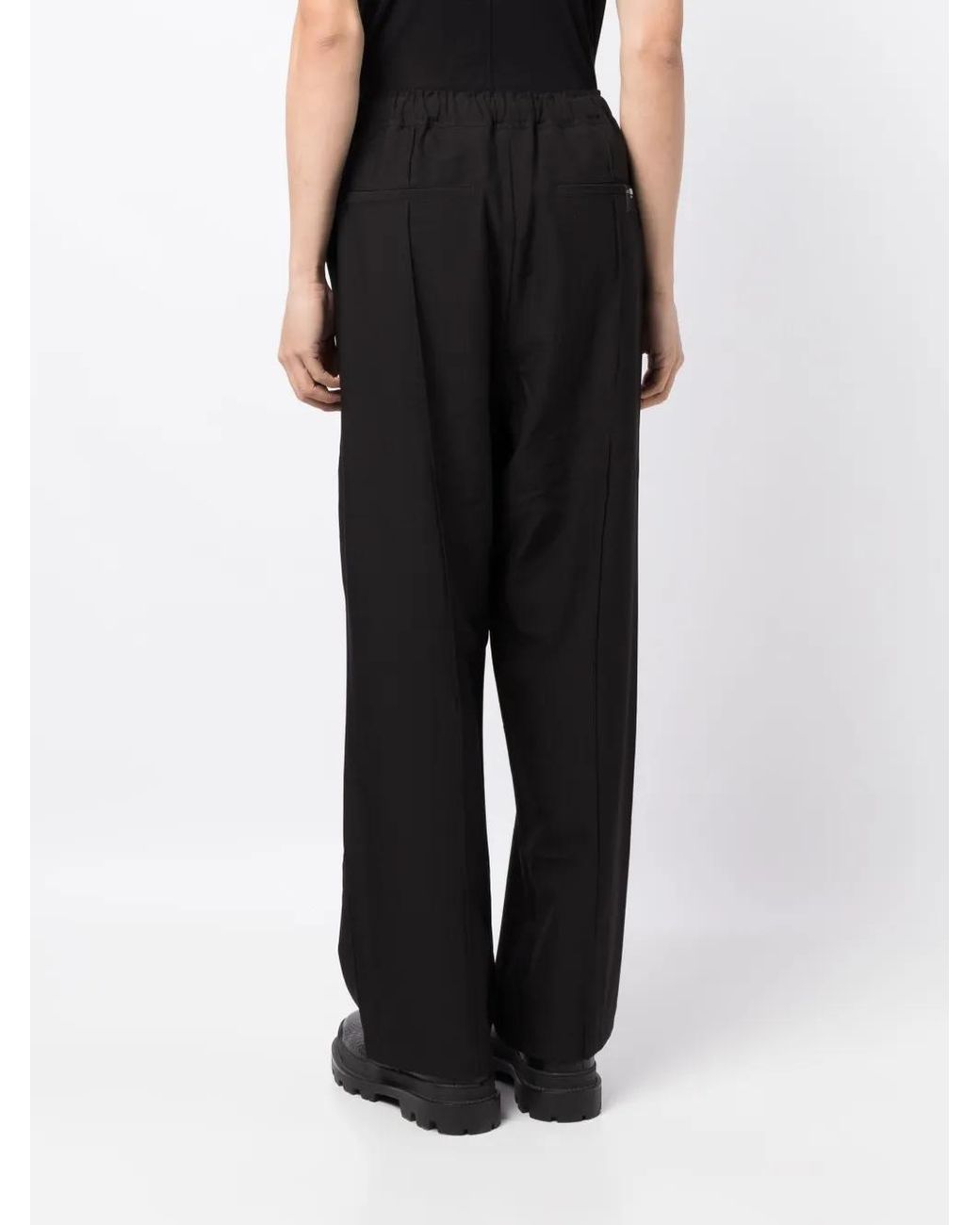 Izzue Black Logo-Plaque Straight-Leg Trousers for men