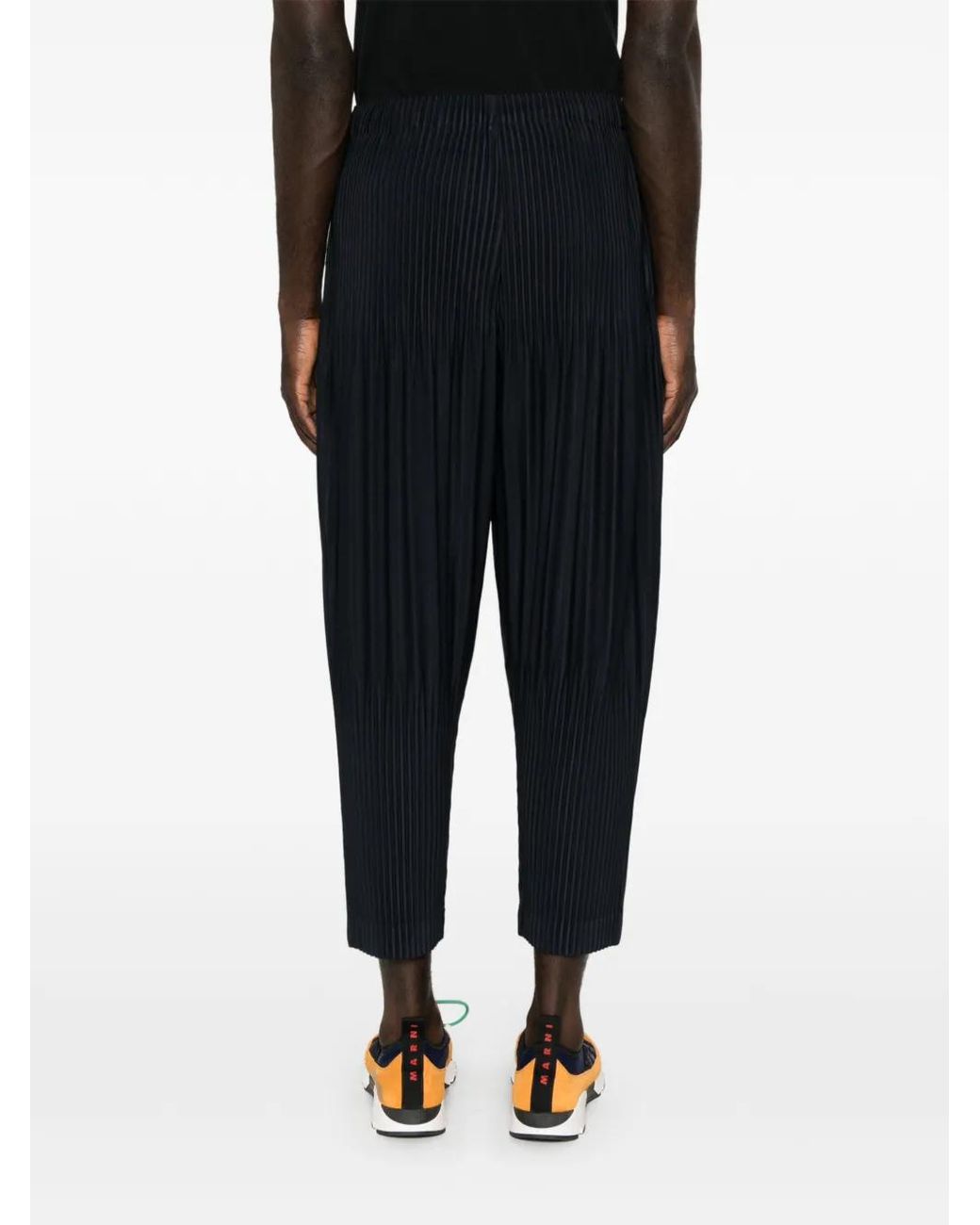 Homme Plissé Issey Miyake Black Pleated Tapered Trousers for men