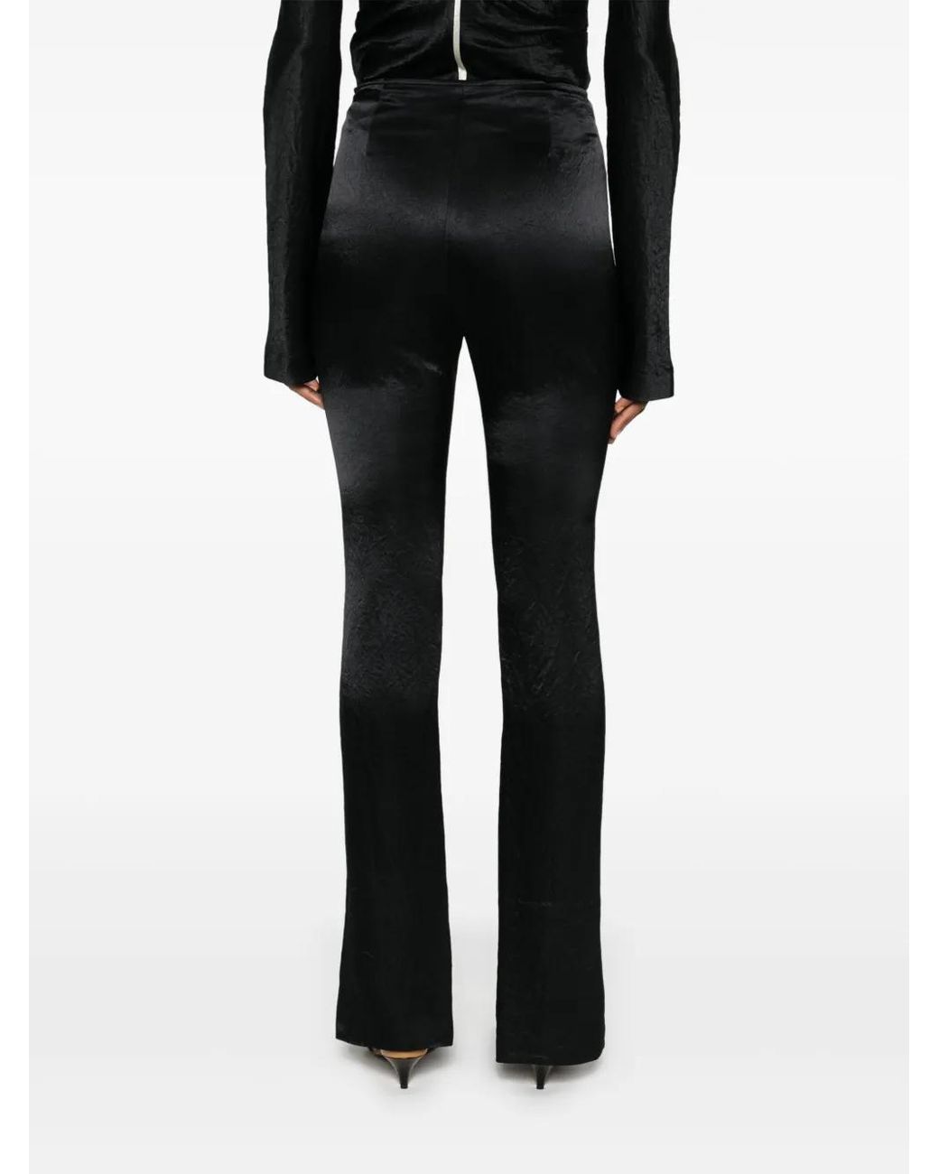 Pantalones slim con ribete en contraste Nanushka de color Black