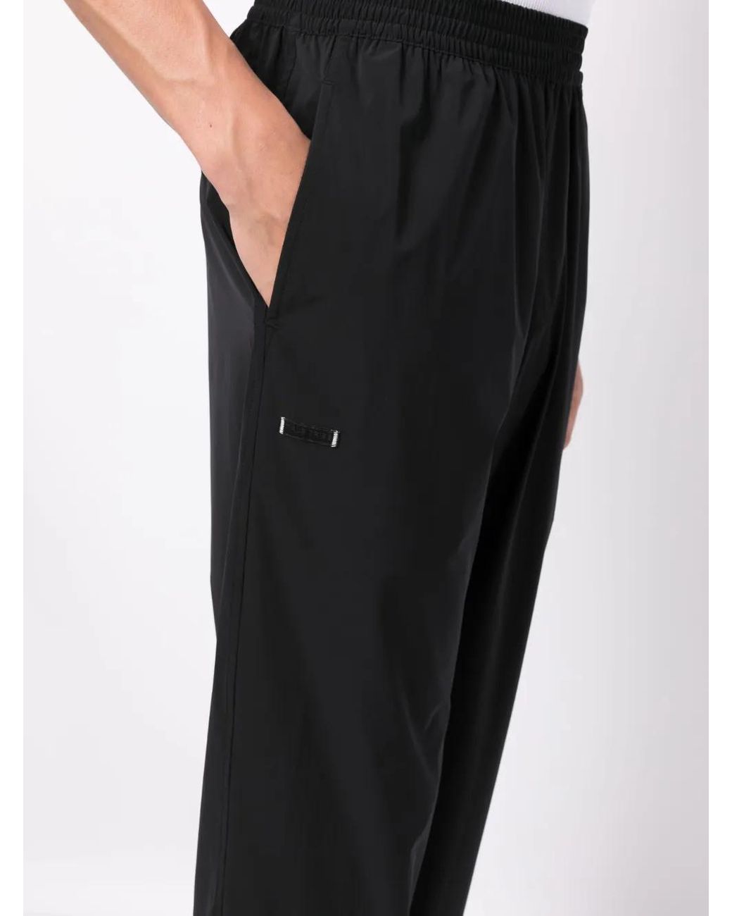 True Tribe Black Logo-Patch Elasticated-Waist Trousers for men