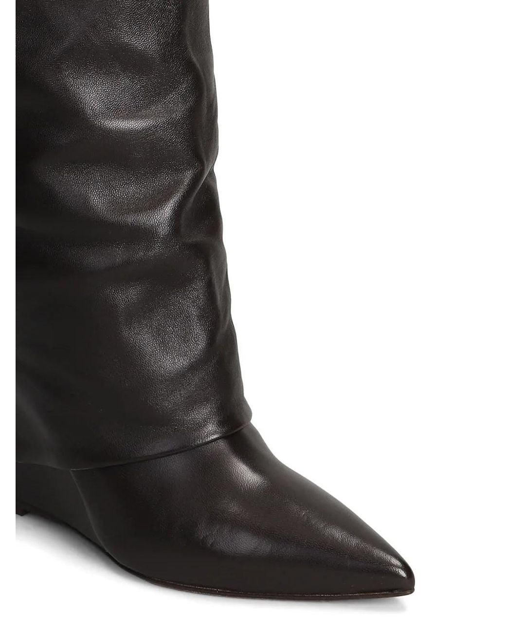 The Seller Black Pointed-Toe Wedge Boots