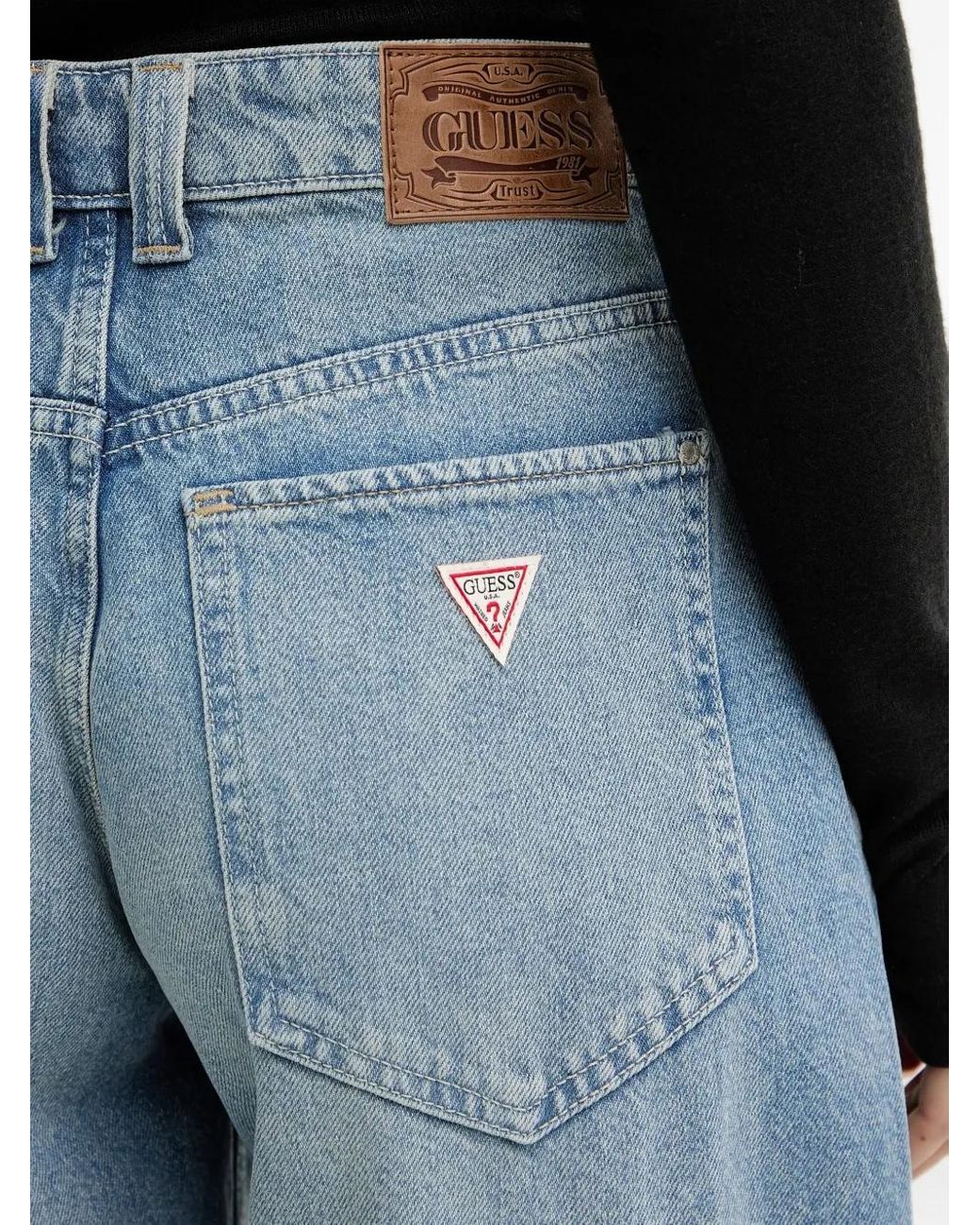 Vaqueros con parche del logo Guess de color Blue