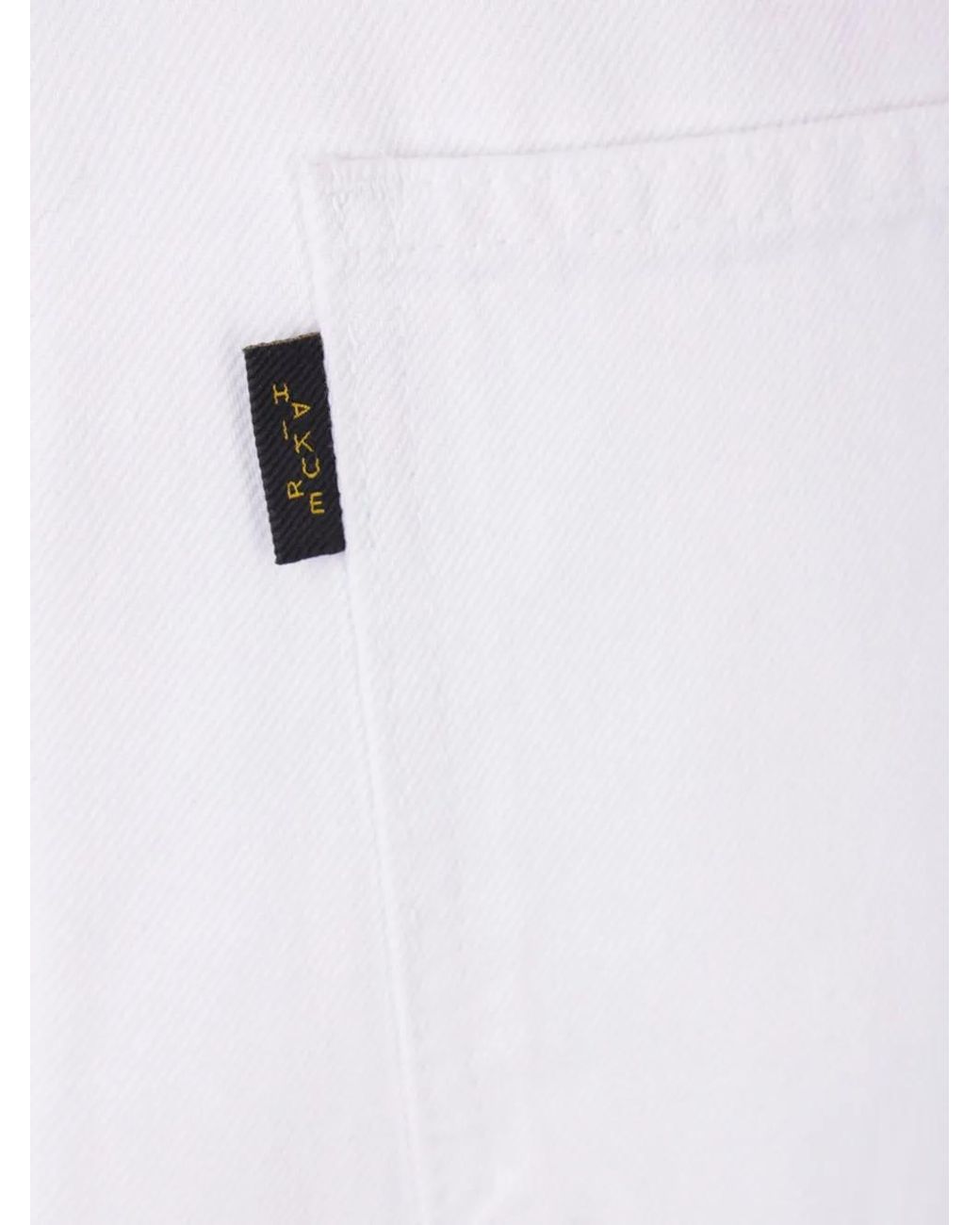 Jean À Patch Logo Haikure en coloris White