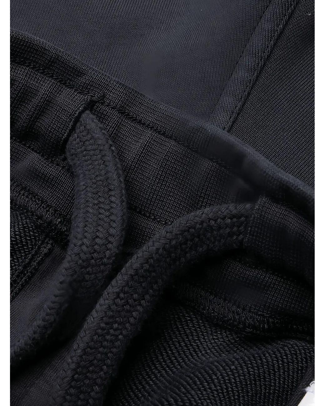 Stone Island Blue Logo-Embroidered Track Pants for men