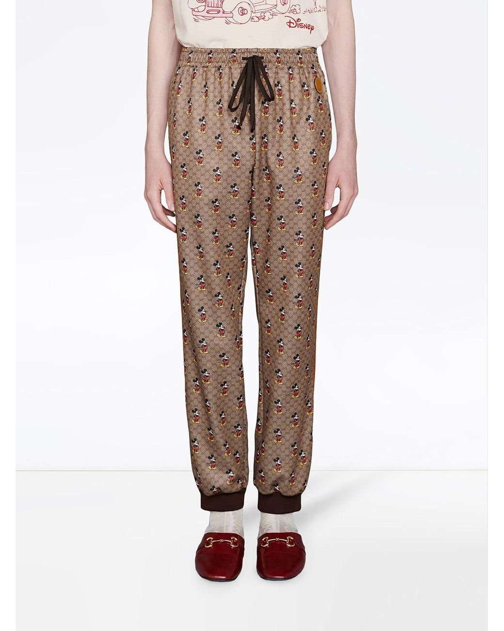 Gucci X Disney Monogram print Track Pants in Brown for Men Lyst