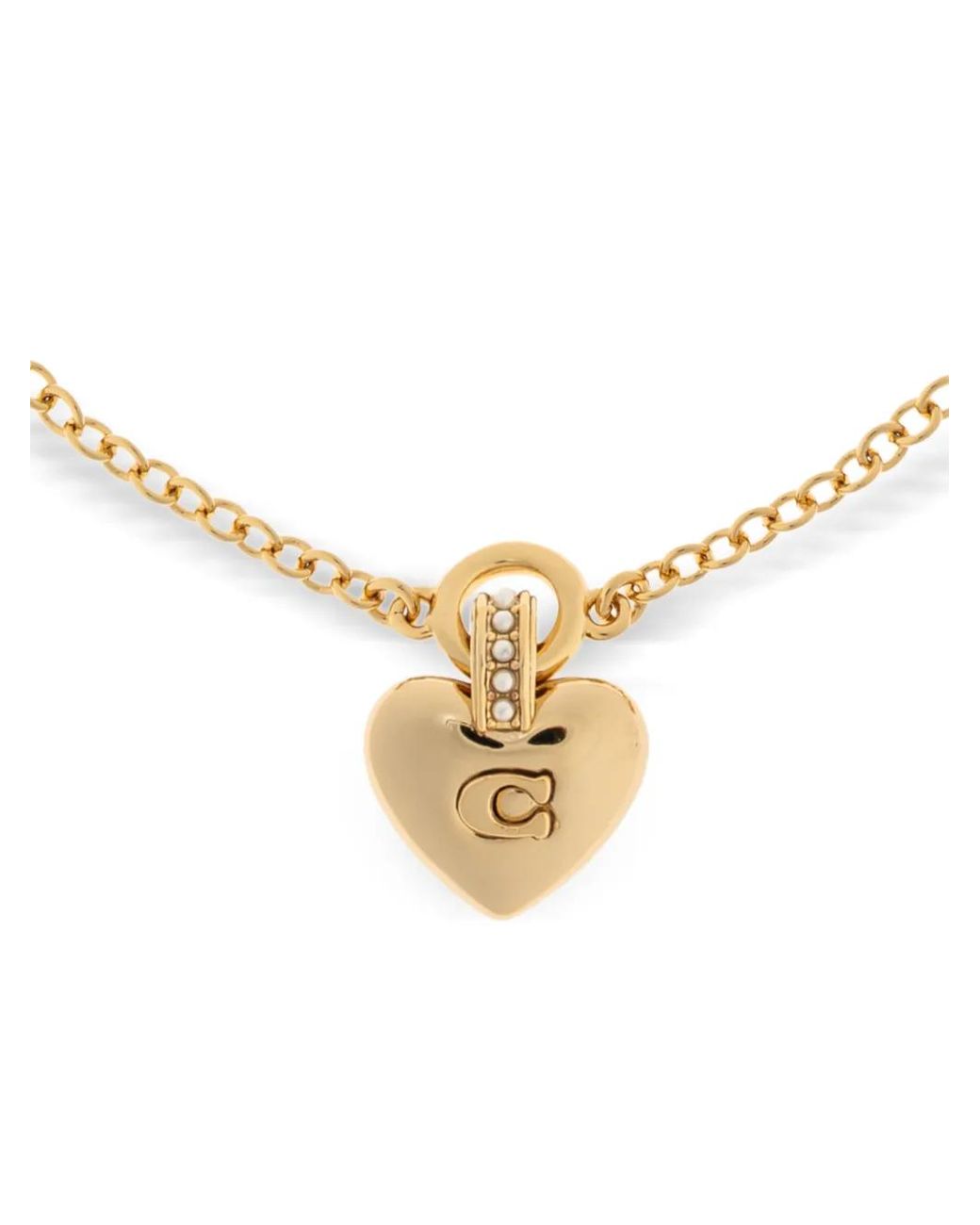 Pulsera con logo y corazón COACH de color Metallic