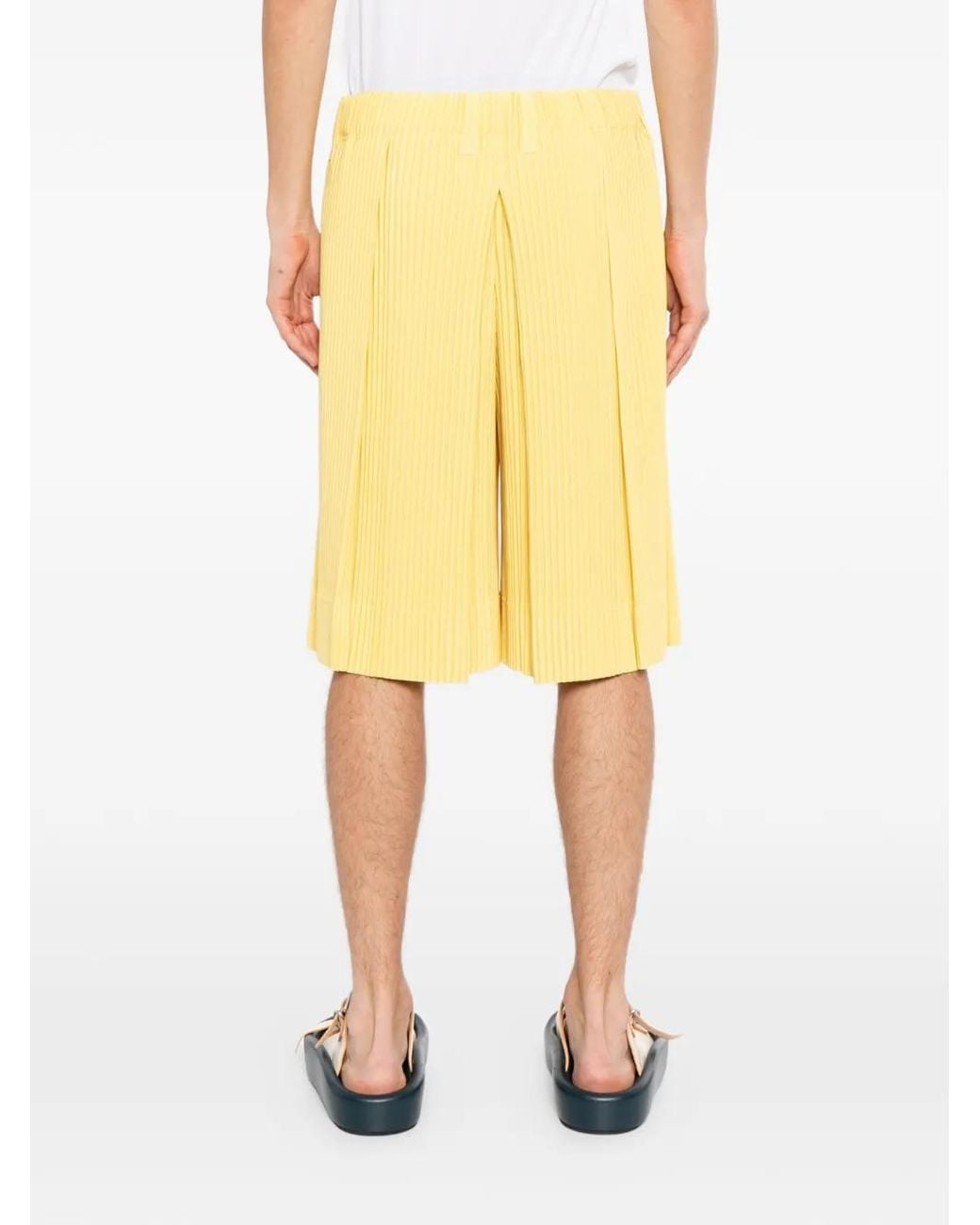 Homme Plissé Issey Miyake Yellow Pleated Shorts for men
