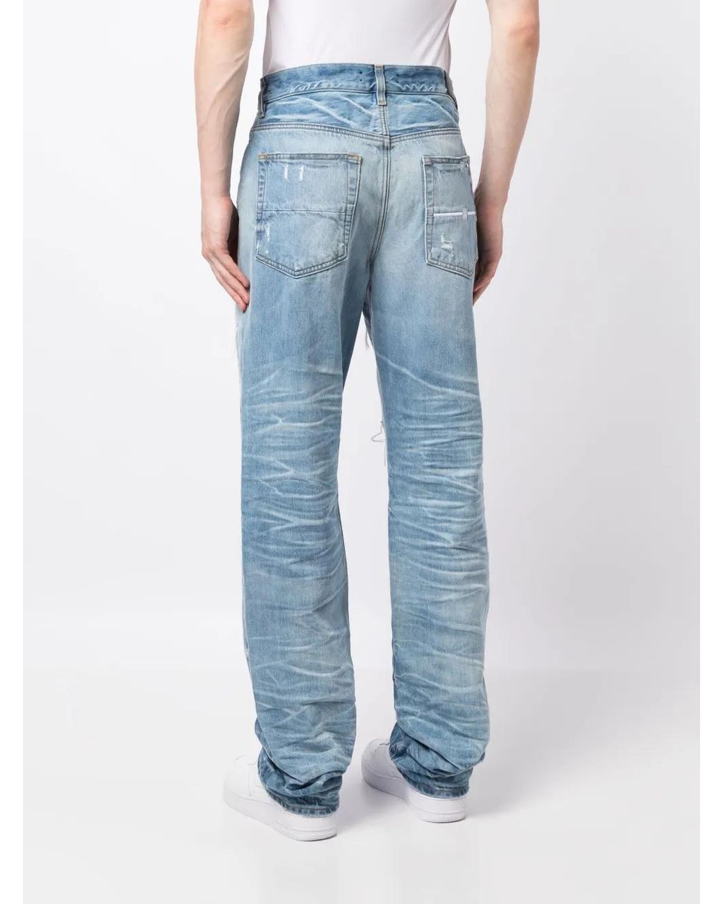Amiri Blue Loose-fit Jeans In Destroyed Denim for men