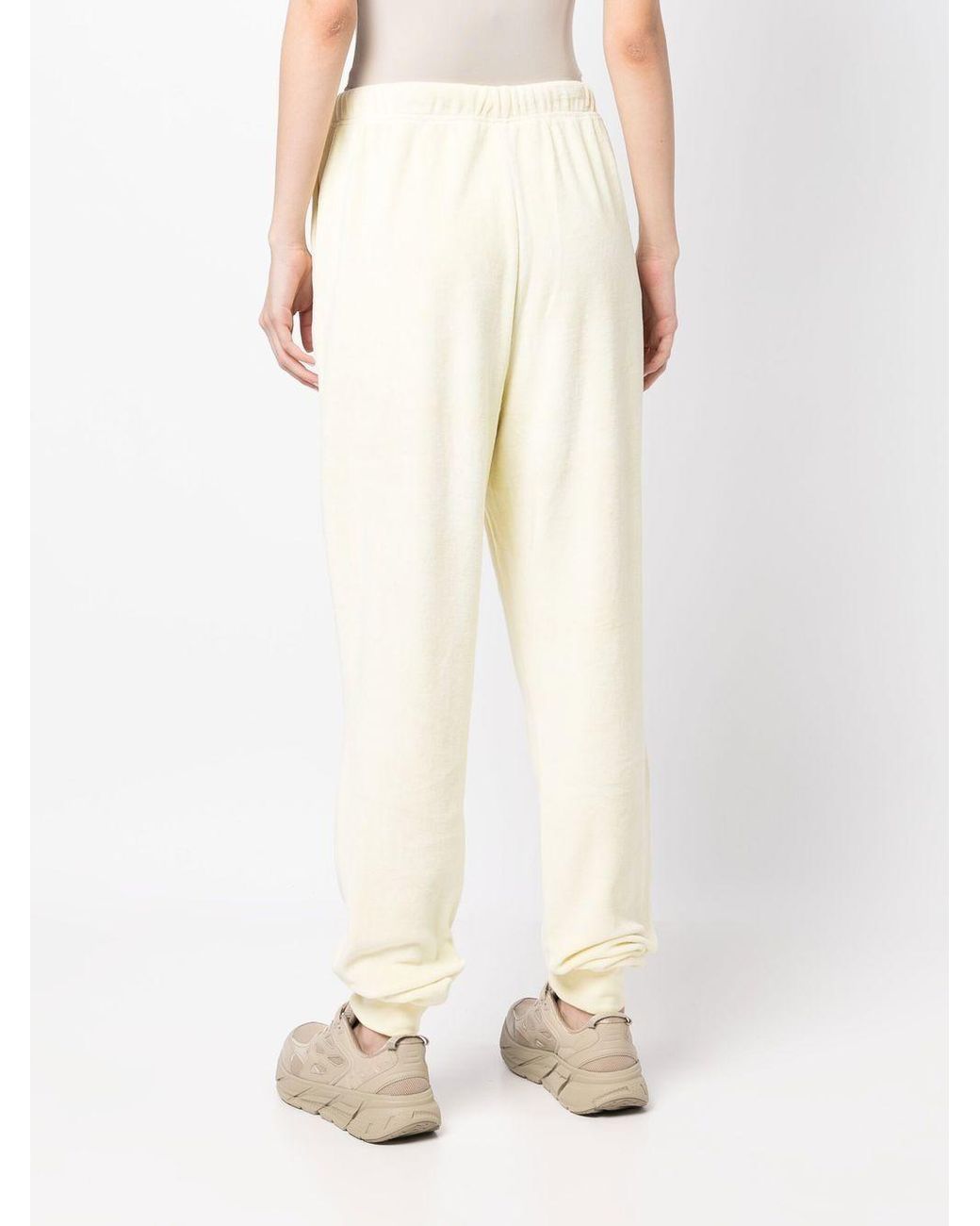 Fear of God ESSENTIALS Logo-patch Detail Track Pants in Yellow | Lyst