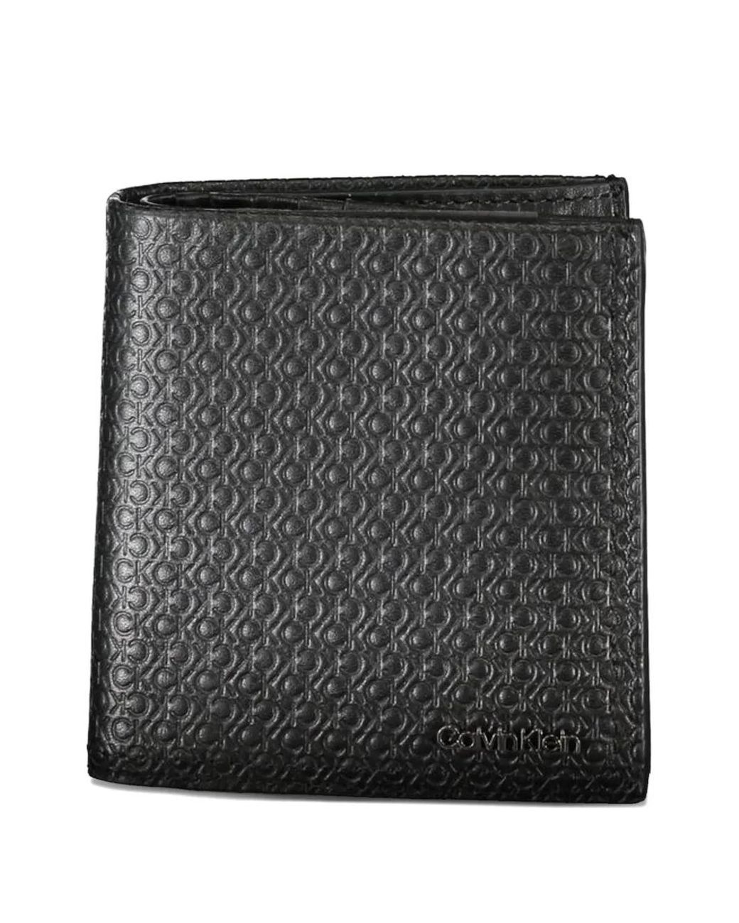 Calvin Klein Black Portefeuille En Cuir À Motif Monogrammé Embossé for men