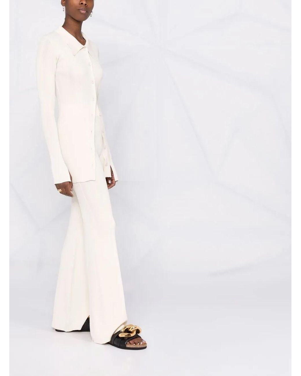 Remain White Fine-Ribbed Flared Trousers