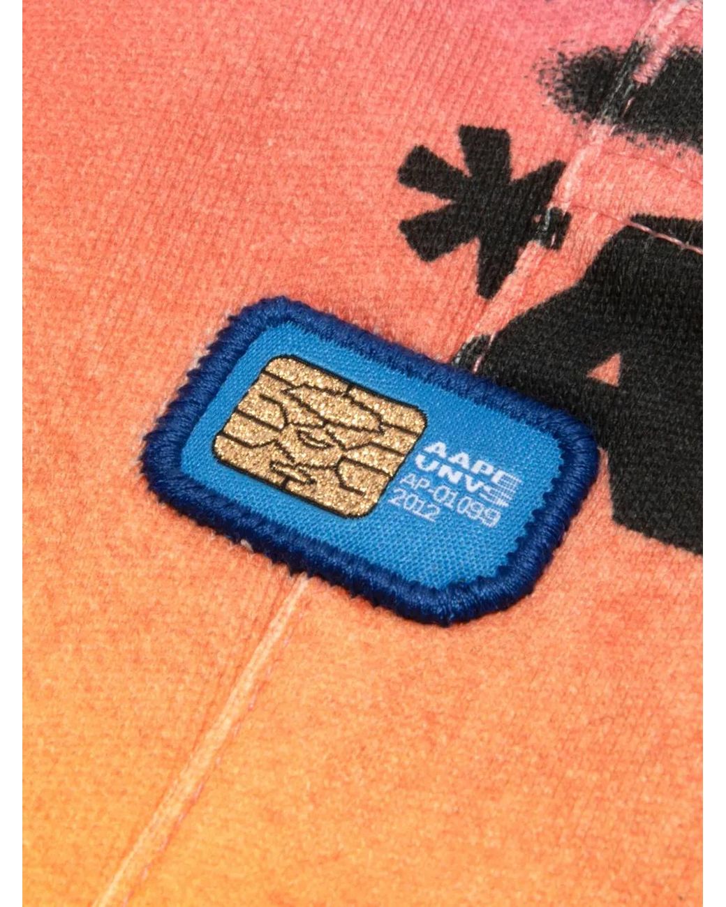 Aape By A Bathing Ape Orange Graffiti-Print Cotton Shorts for men
