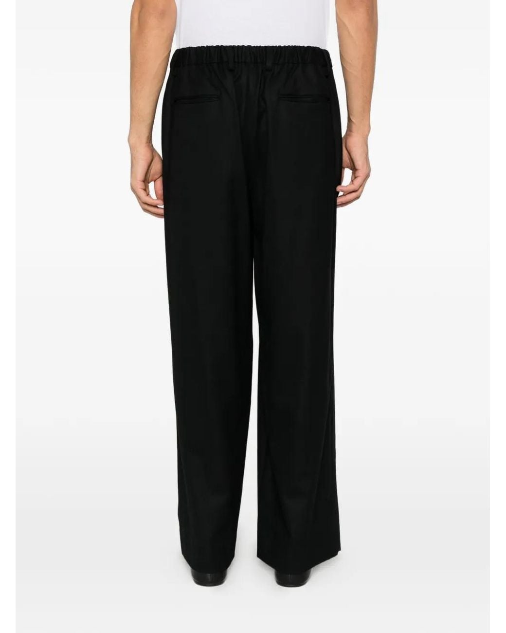 Ssstein Black Pleated Wide-Leg Trousers for men