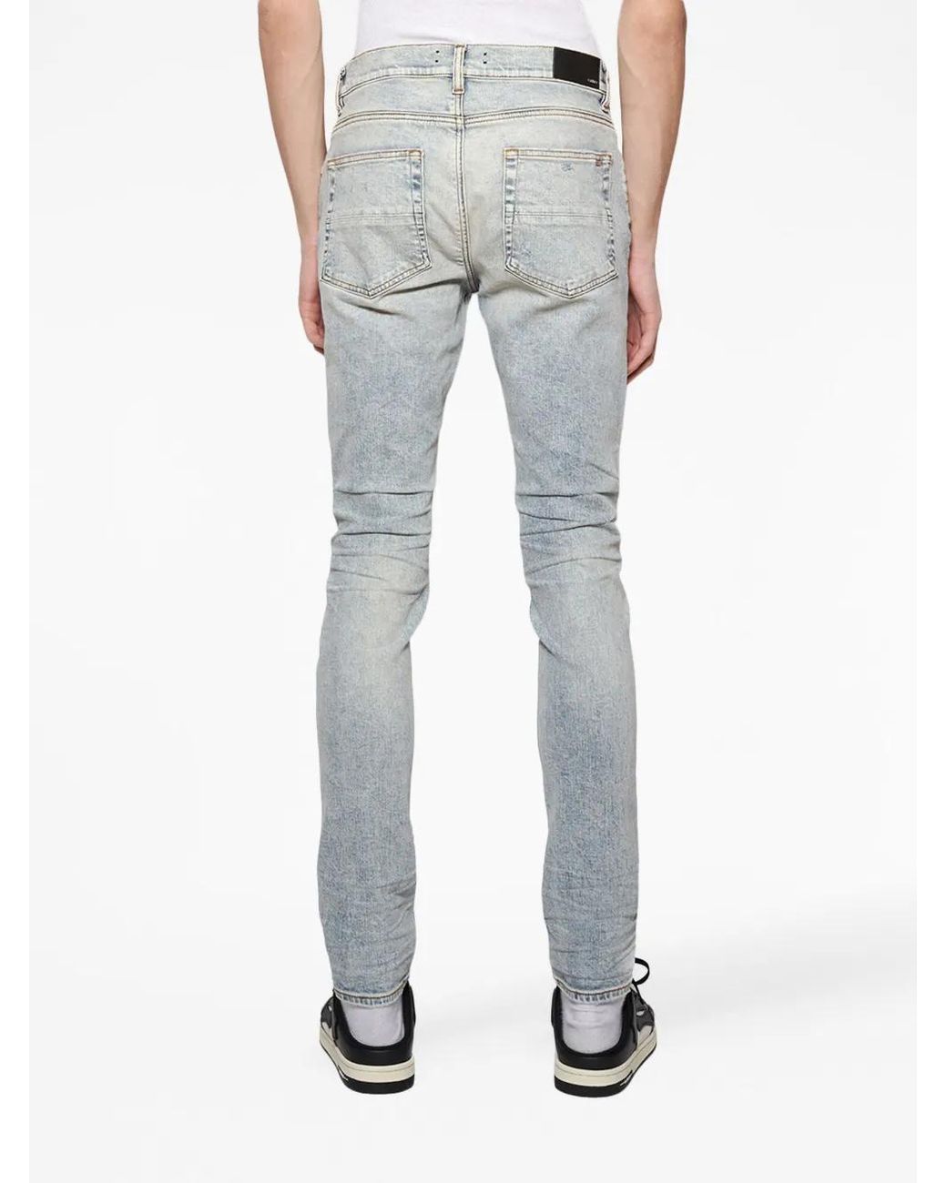 Amiri Blue Mx1 Ripped Skinny Jeans for men