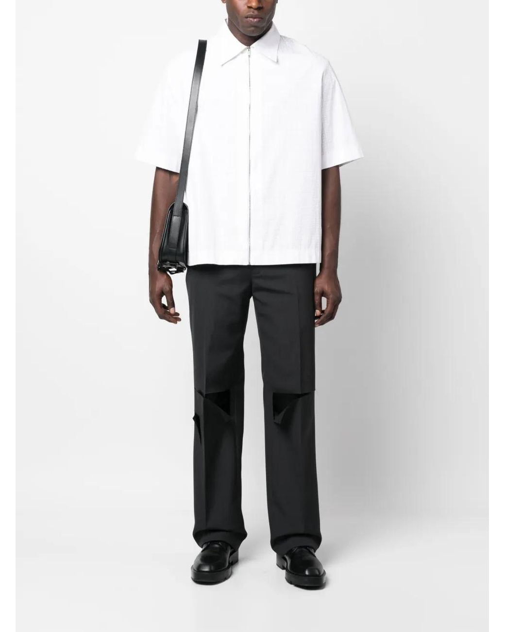 Givenchy Black Distressed Wool Trousers for men