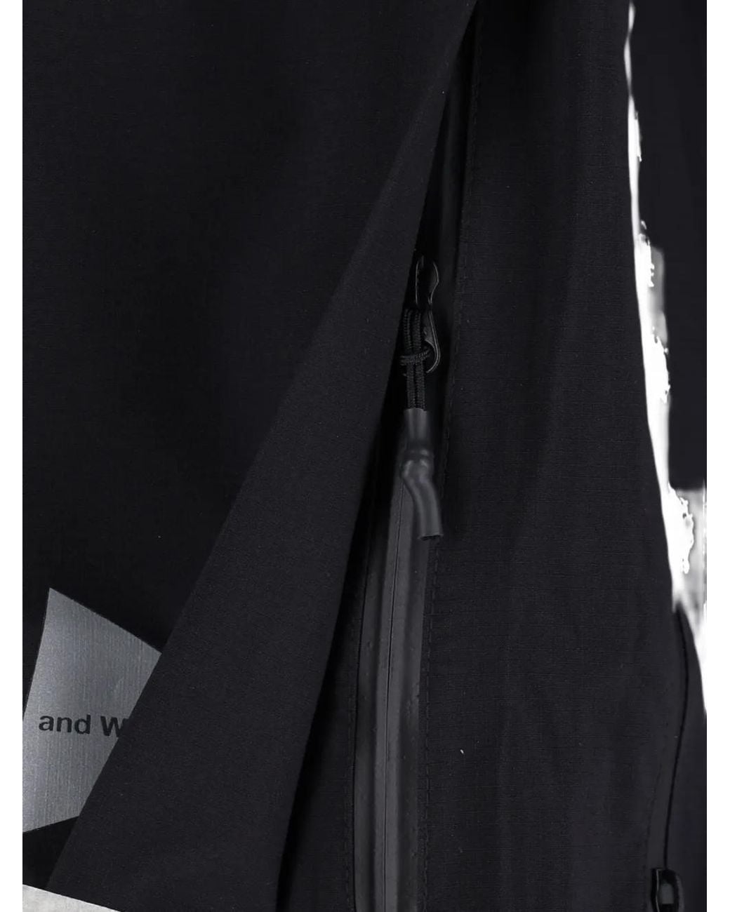 And Wander Black Pertex Shield Jacket for men