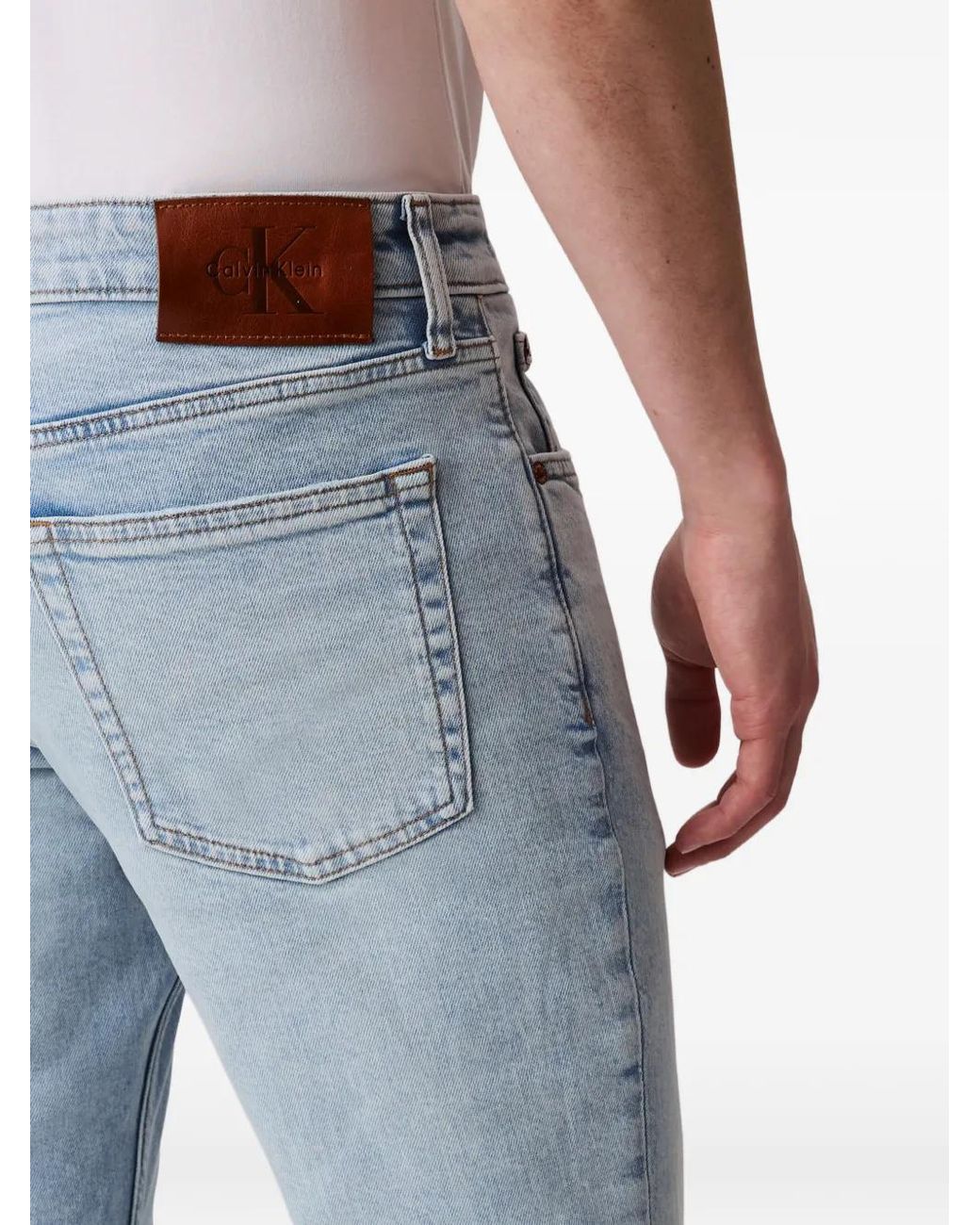 Jean Slim À Patch Logo Calvin Klein pour homme en coloris Blue