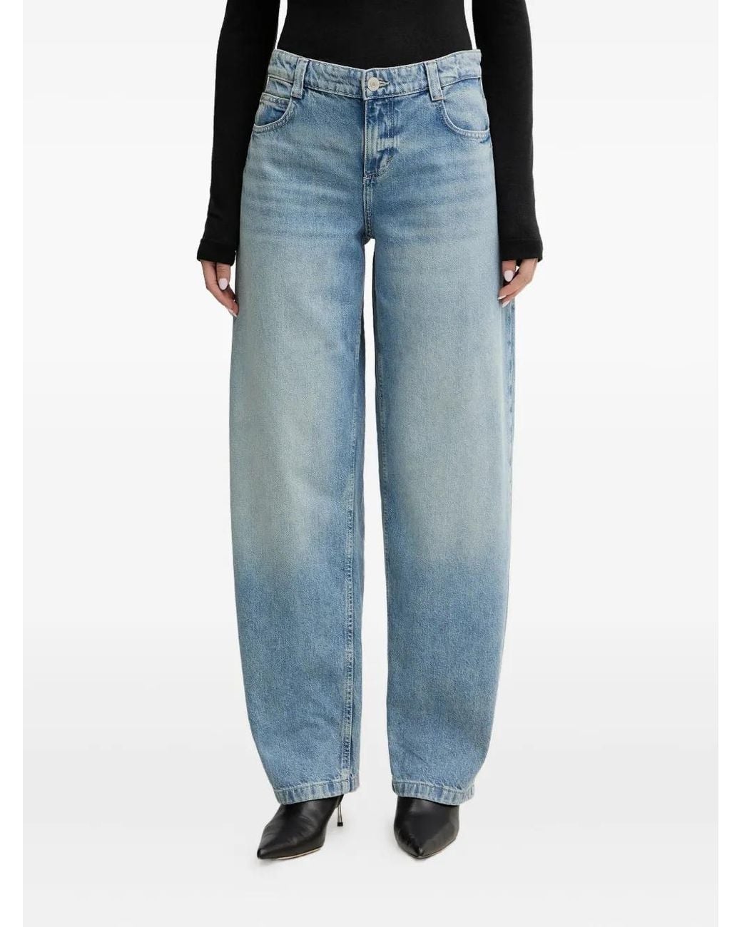 Vaqueros con parche del logo Guess de color Blue