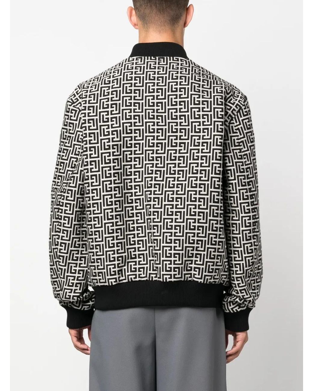 Balmain Black Reversible Monogram Bomber Jacket for men