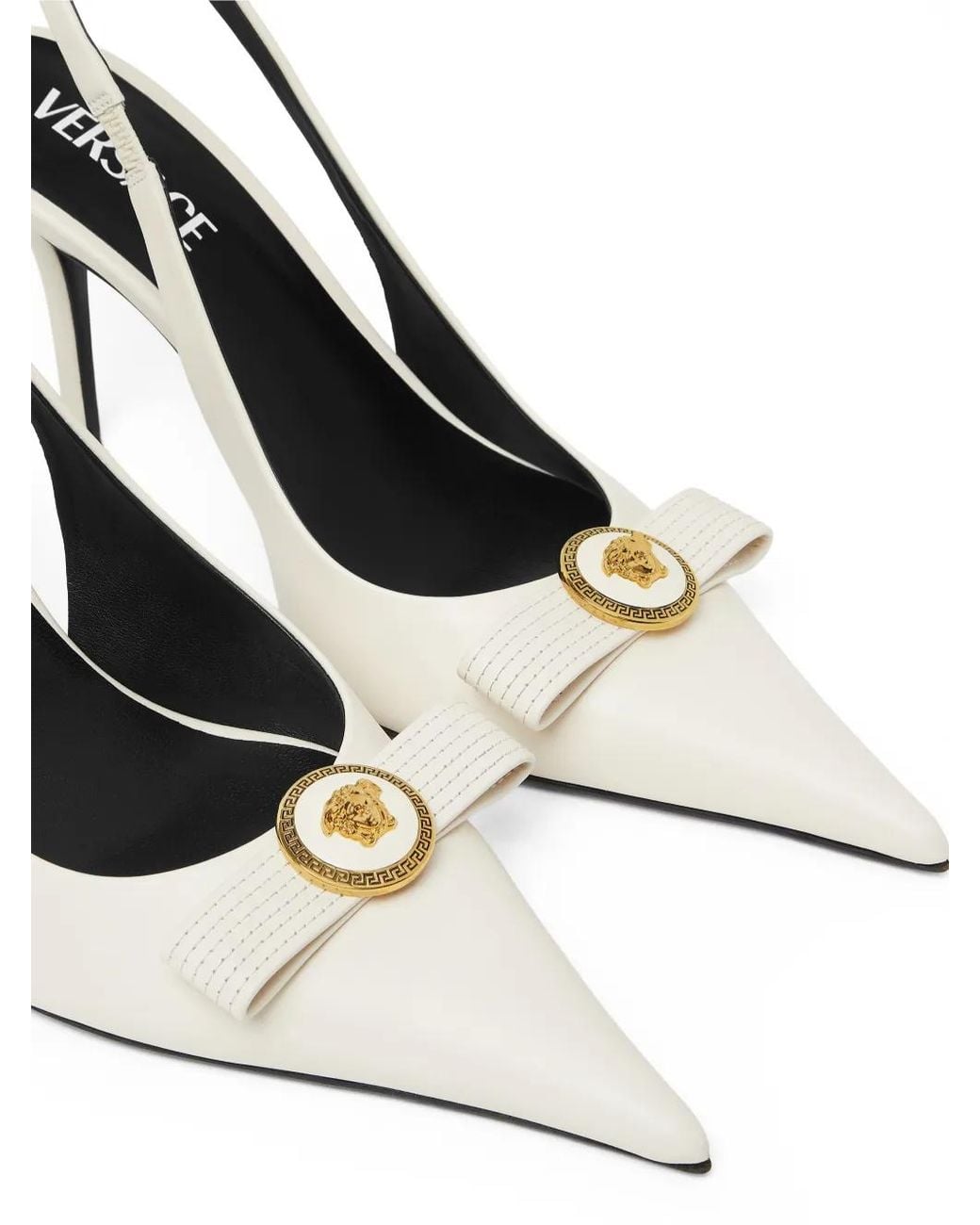Versace White Pointed Toe Slingback Heels With Textured Bow And Medallion