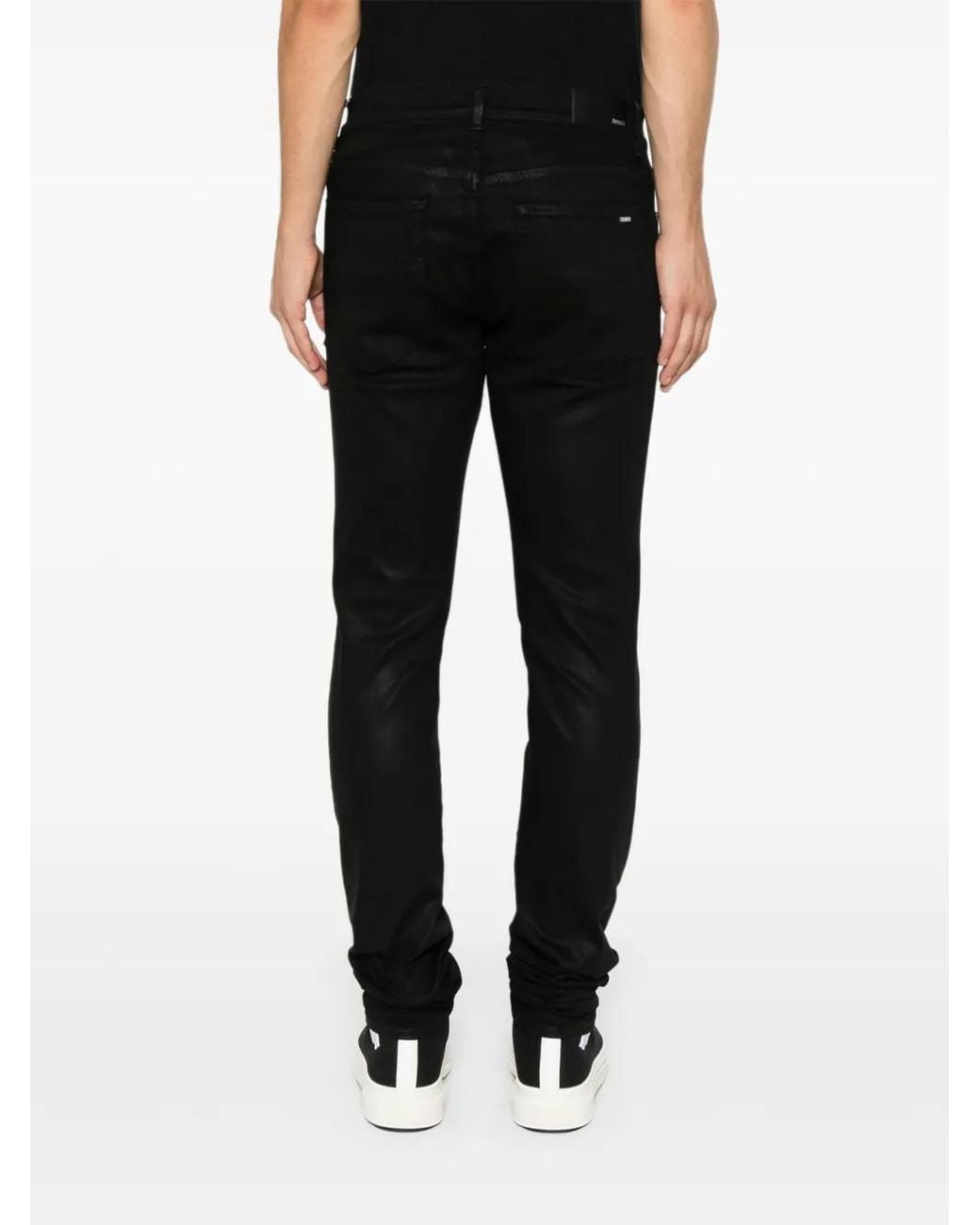 Amiri Black Distressed-Effect Coated Jeans for men