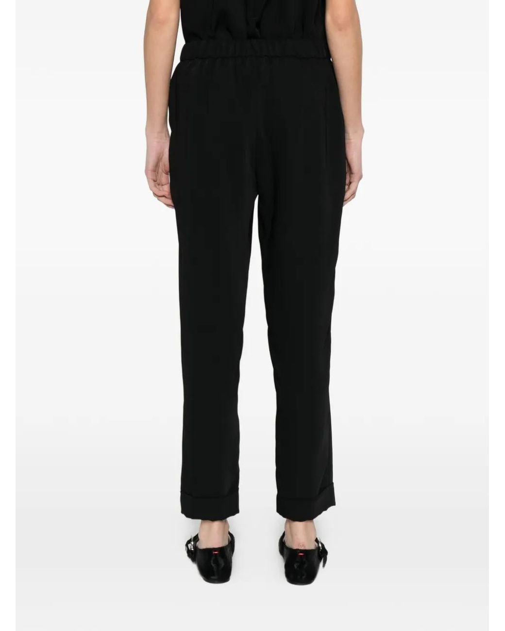 Pantalones Con Dobladillo Ajustado P.A.R.O.S.H. de color Black