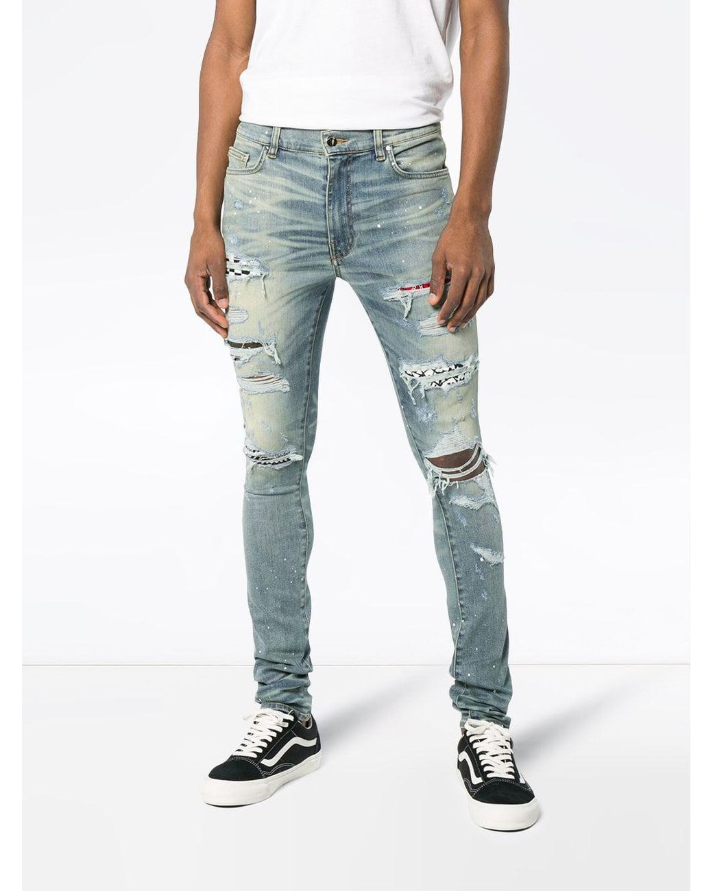 Amiri Denim Art Patch Printed Jeans in 