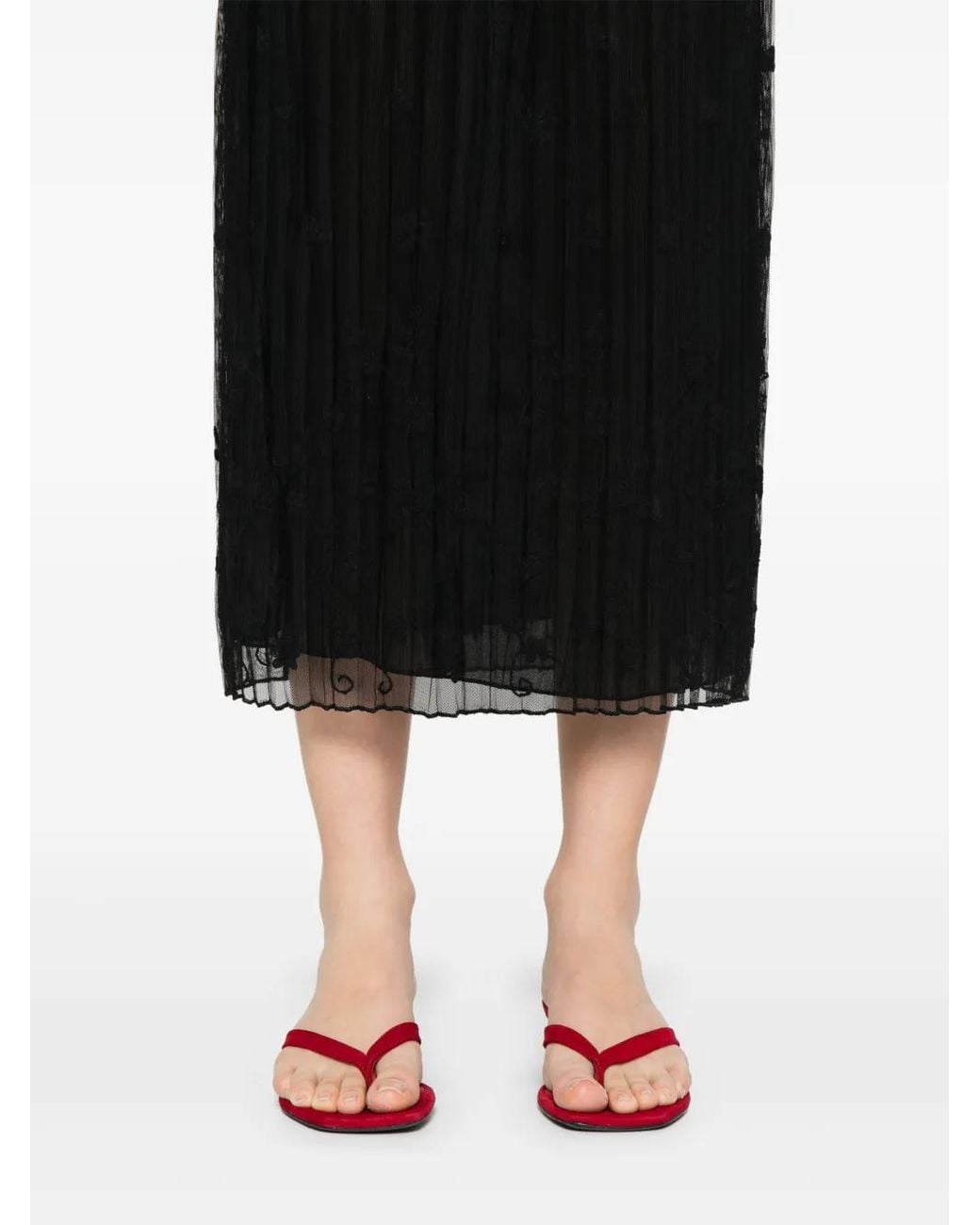 Falda acampanada con bordado floral Totême de color Black