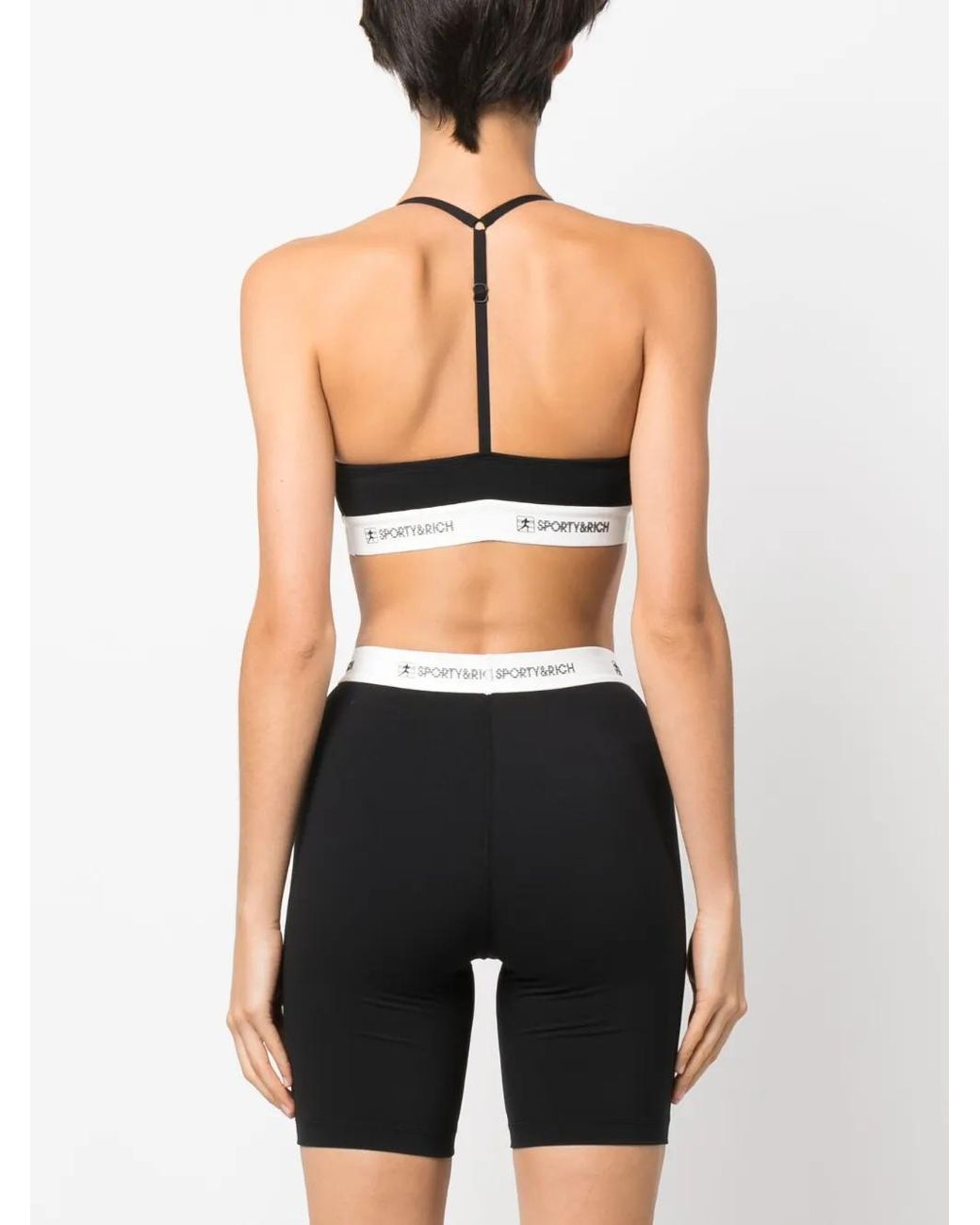Sporty & Rich Black Solid Color Versatile Top