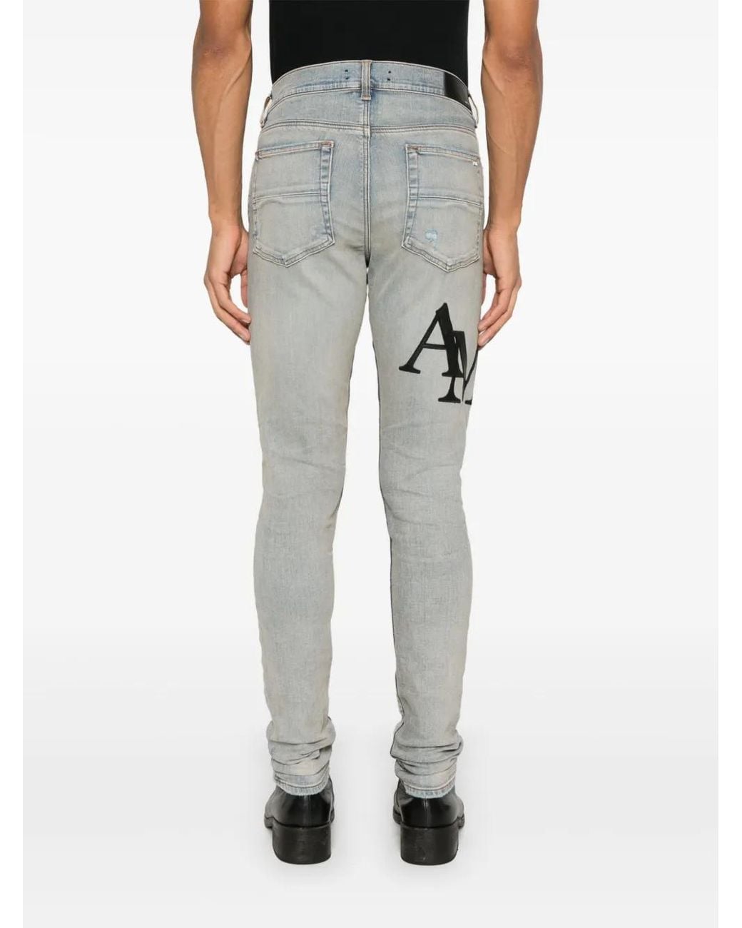 Amiri Blue Skinny Jeans With Offset Logo for men