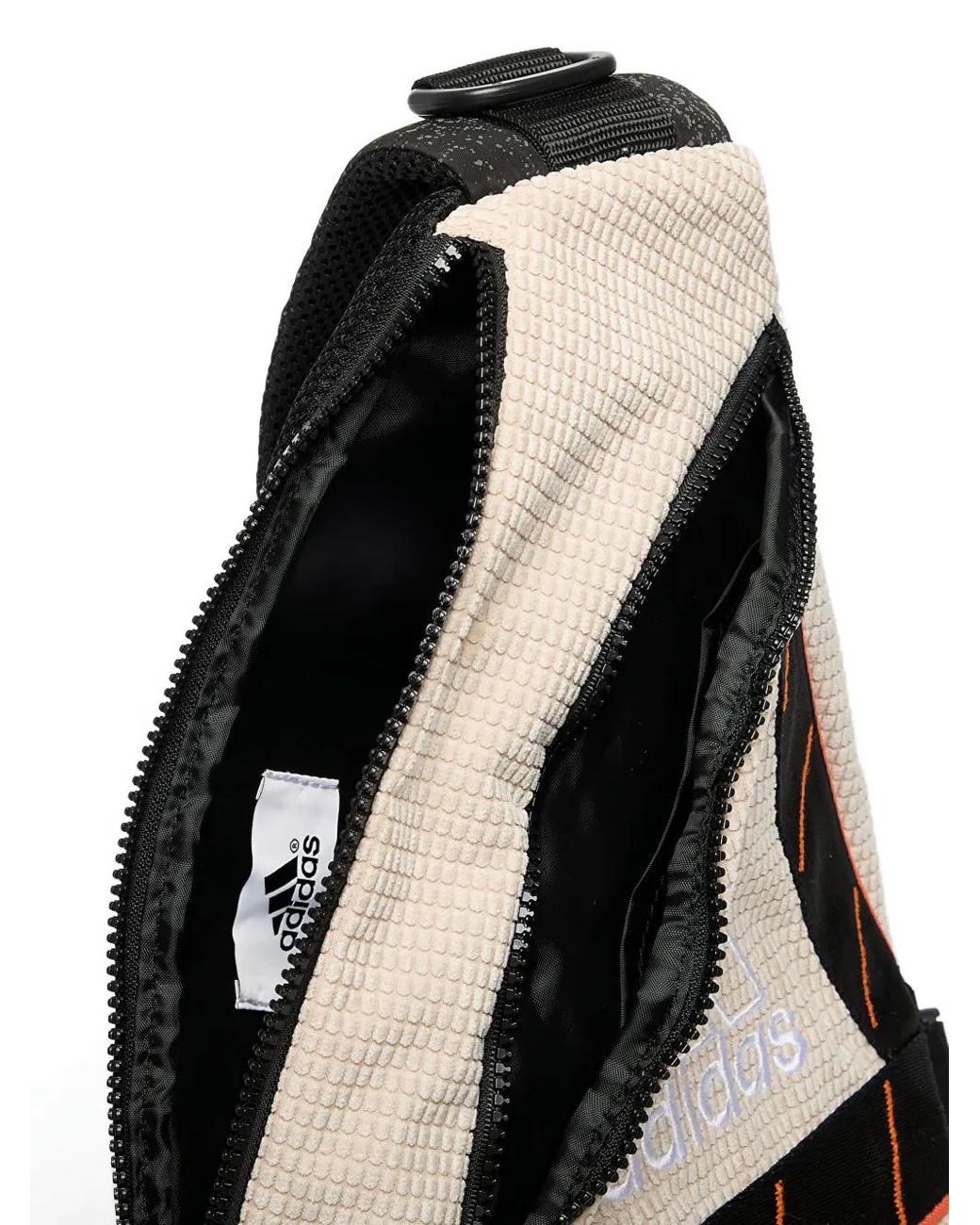 adidas backpack one strap One-Shoulder Sling Bag This bookbag features multiple zippered pockets for plenty of storage space and is made of a durable material for lasting appeal Adidas Backpack Single Strap Adidas