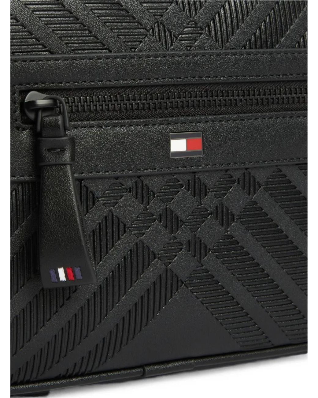 Tommy Hilfiger Black Monogram-Embossed Messenger Bag for men