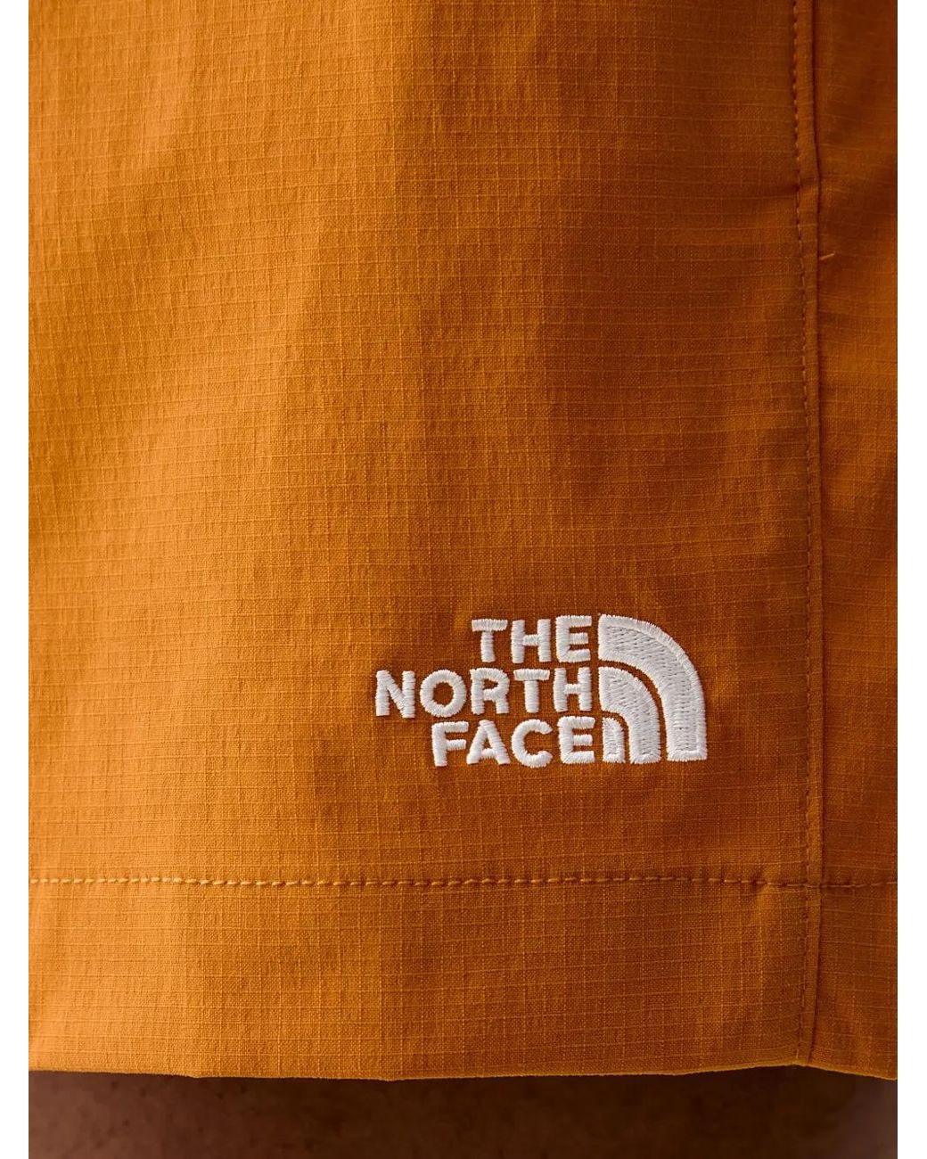 The North Face Orange Class V Pathfinder Running Shorts for men