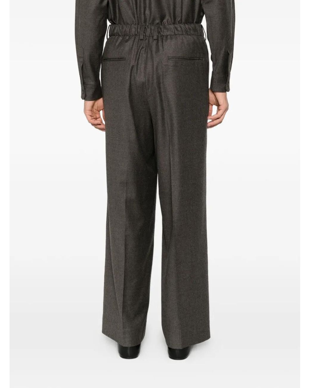 Ssstein Gray Pleated Wide-Leg Trousers for men