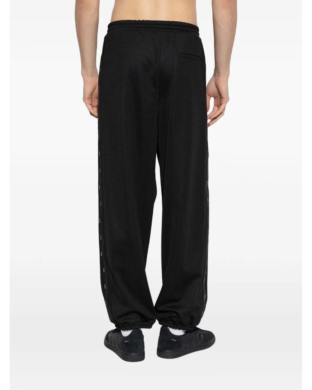 Moschino Black Logo Stripe Trousers for men