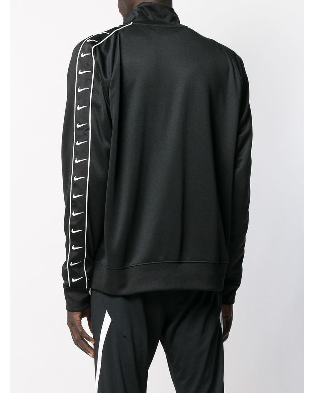 Nike Baumwolle Trainingsjacke mit Logo-Streifen in Schwarz für Herren |  Lyst DE