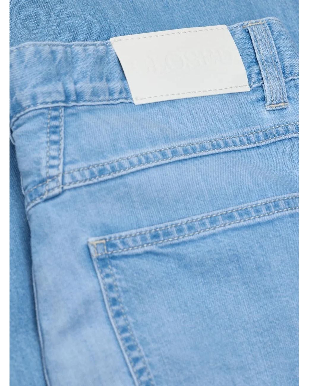 Jean Ample Glow Up Closed en coloris Blue