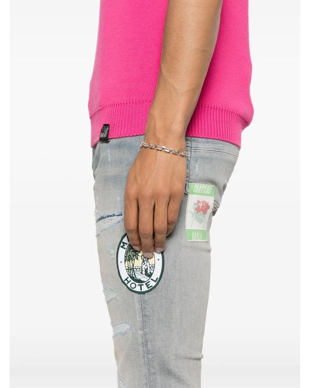 Amiri Blue Travel Patch Repair Skinny Jeans for men