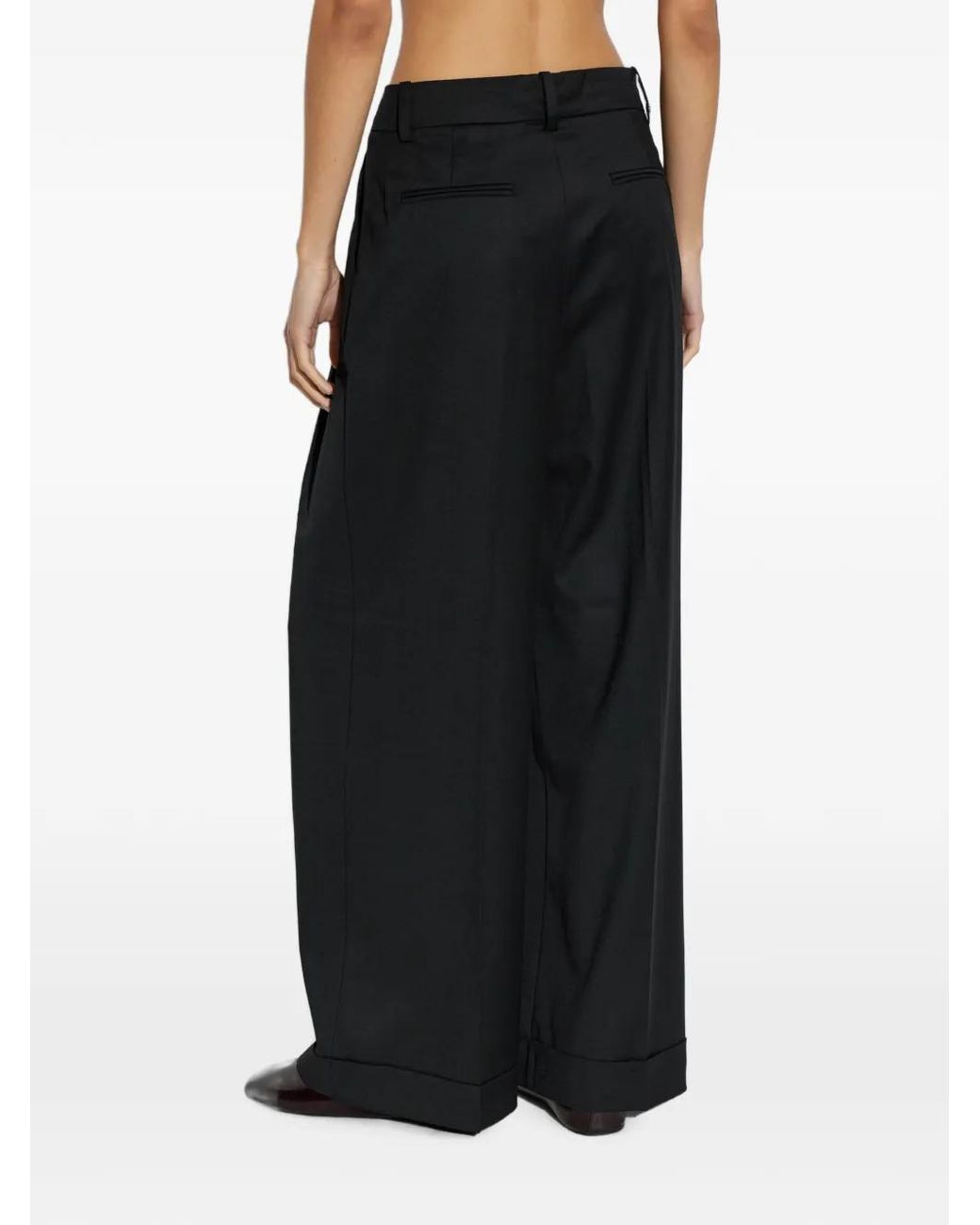 Ganni Black Pantalon Ample À Design Plissé