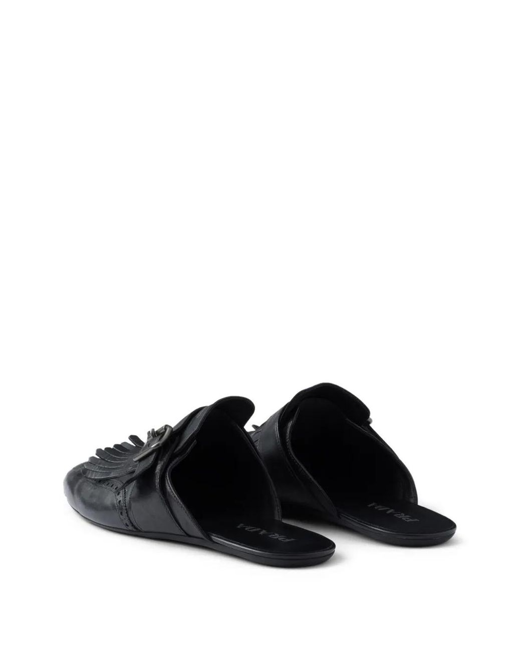 Prada Shuffle Antiqued Leather Mules With Buckled Strap And Fringe