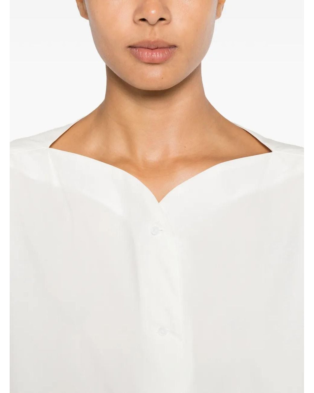 Psophia White Ruffled-Hem V-Neck Cotton Blouse