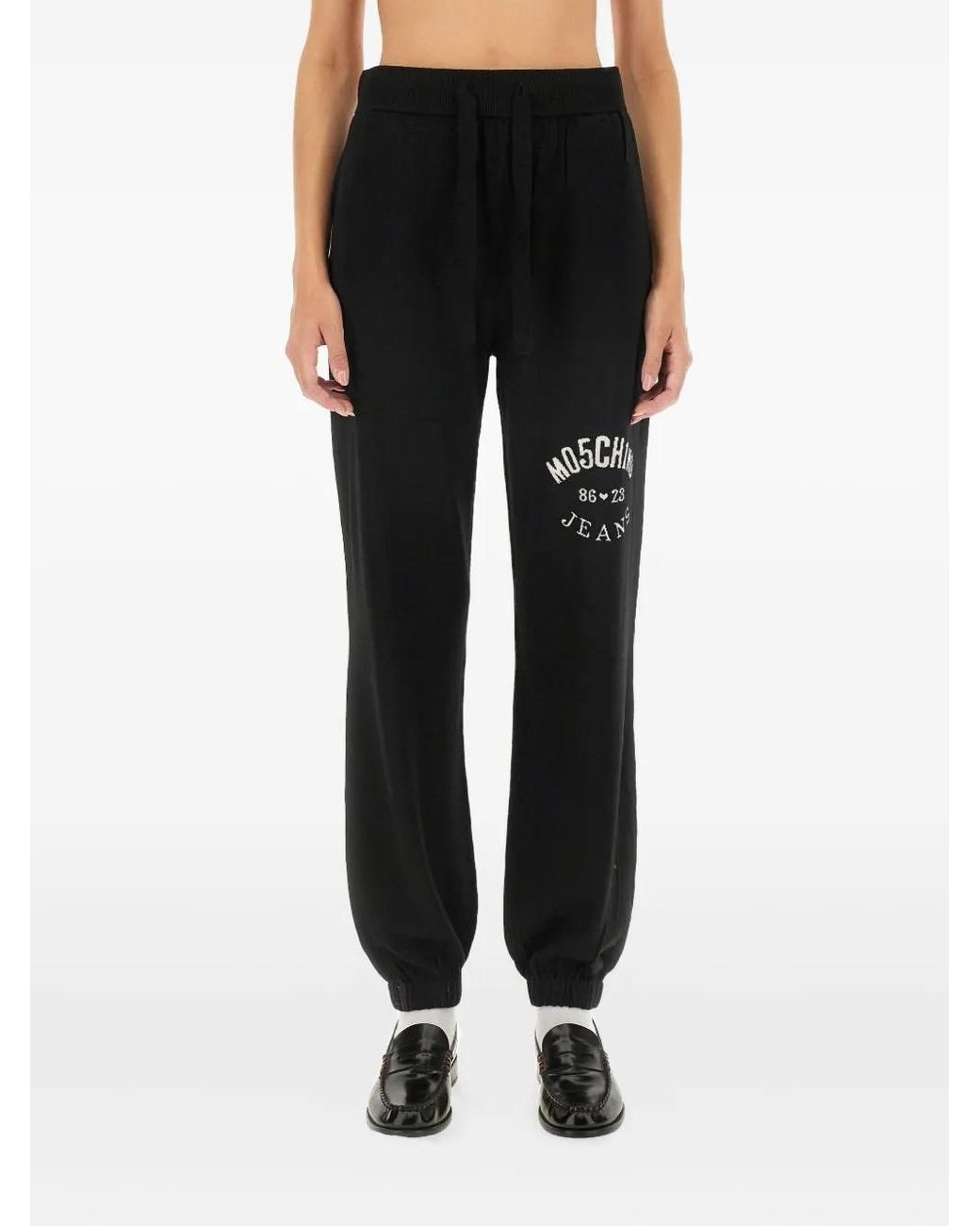 Pantalones Con Cordones Y Logo Moschino de color Black