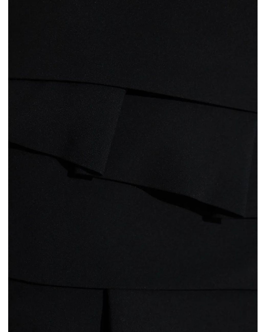 Short Skirts Versace en coloris Black