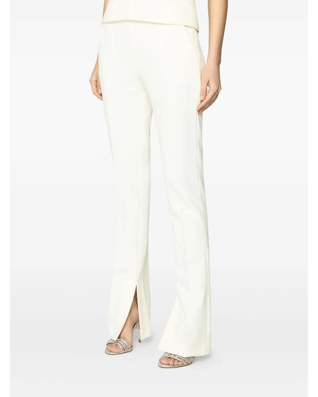 Genny White Flared-Hem Trousers