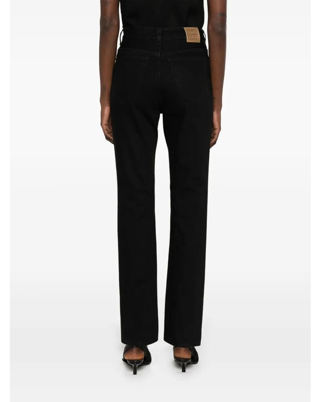 Totême  Black Jeans Mit Logo-Patch