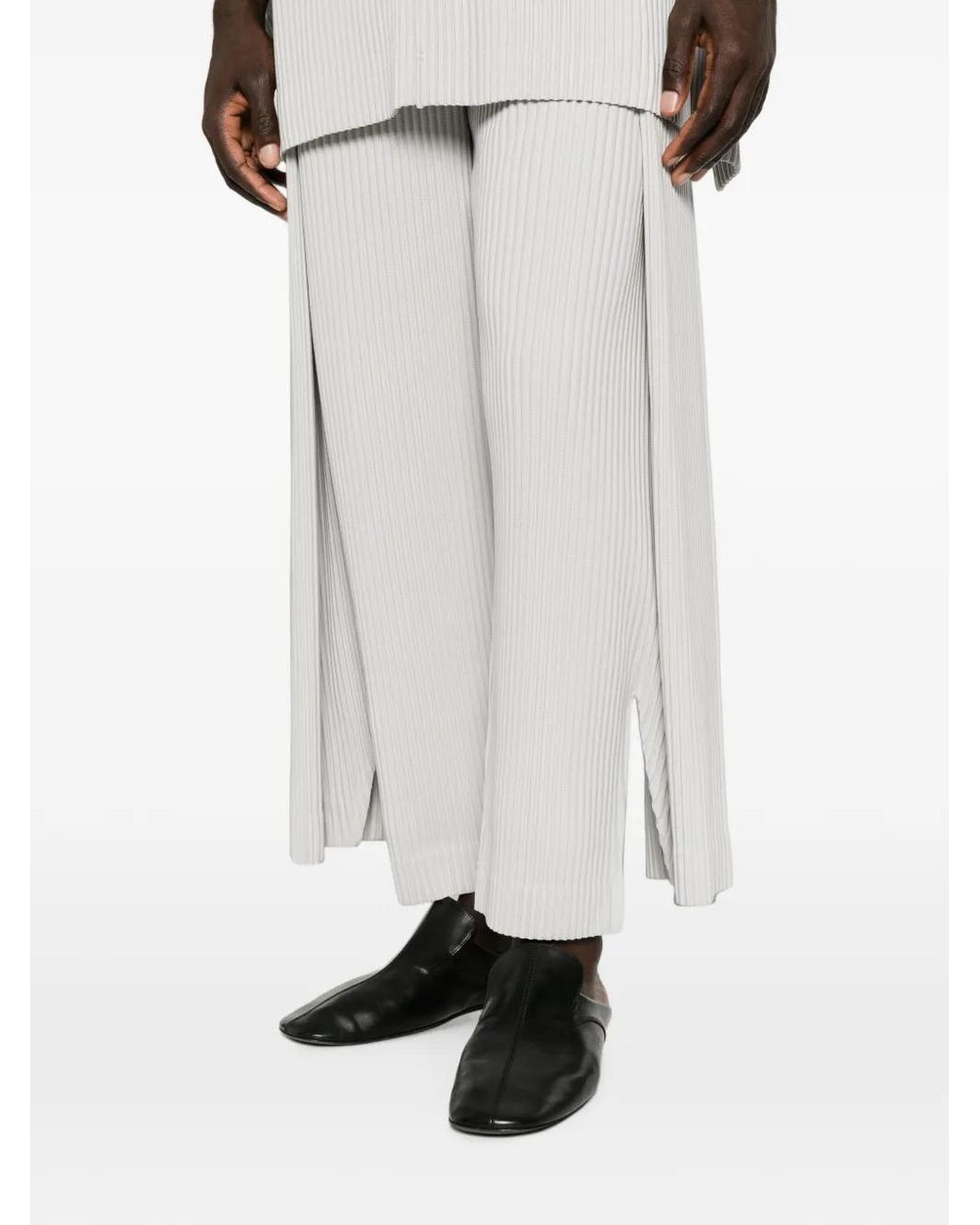 Homme Plissé Issey Miyake White Motion Blur Pleated Trousers for men