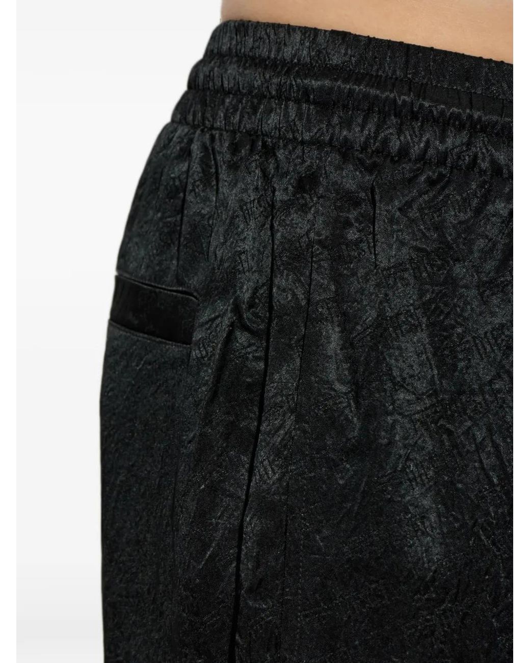 DIESEL Black Logo-Jacquard Elasticated-Waistband Trousers for men