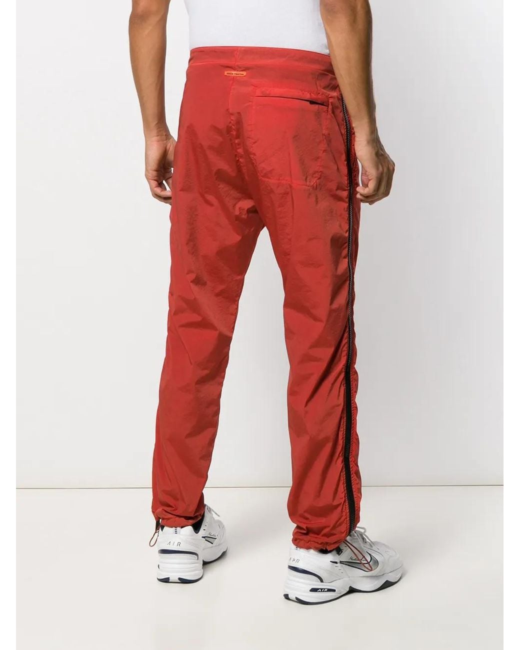 Heron Preston Red Side Zipped Trousers for men