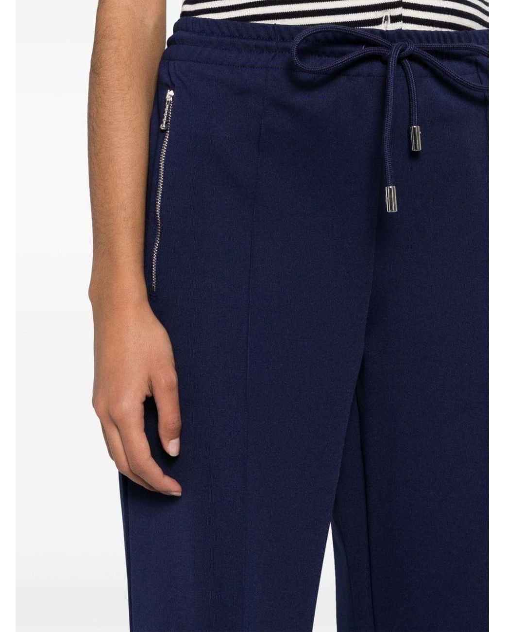 BOOTCUT TRACK PANTS in blue