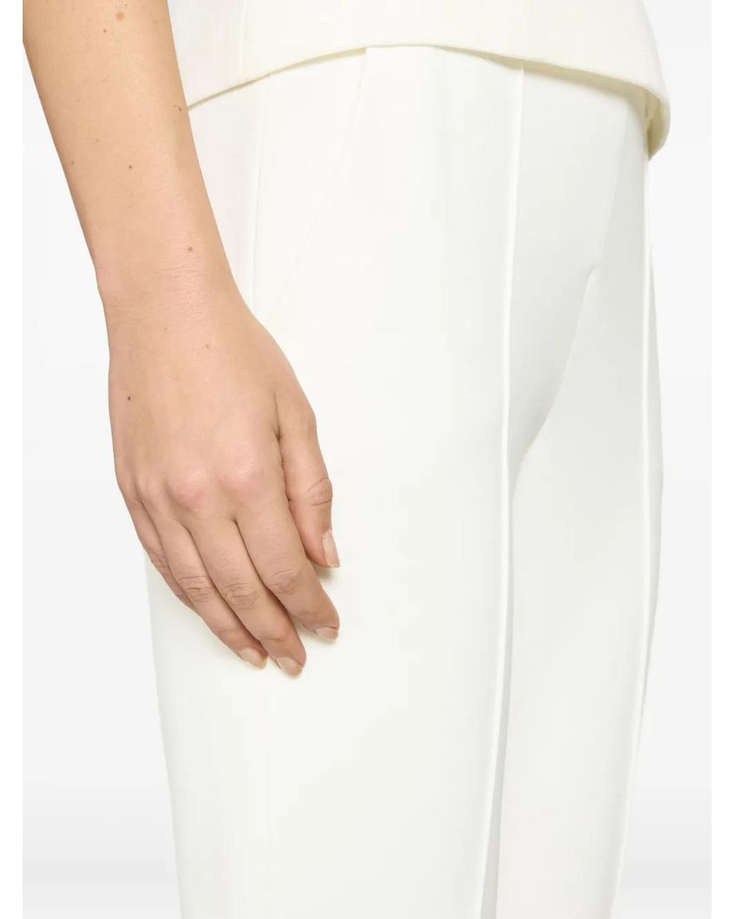 Genny White Flared-Hem Trousers